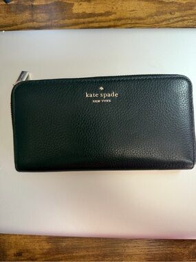kate spade black pebbled leather zip-around wallet with gold logo
